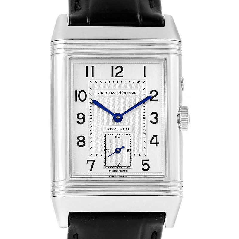 This image shows a frontal view of the dial and part of the leather strap of the Jaeger-LeCoultre Reverso model watch.