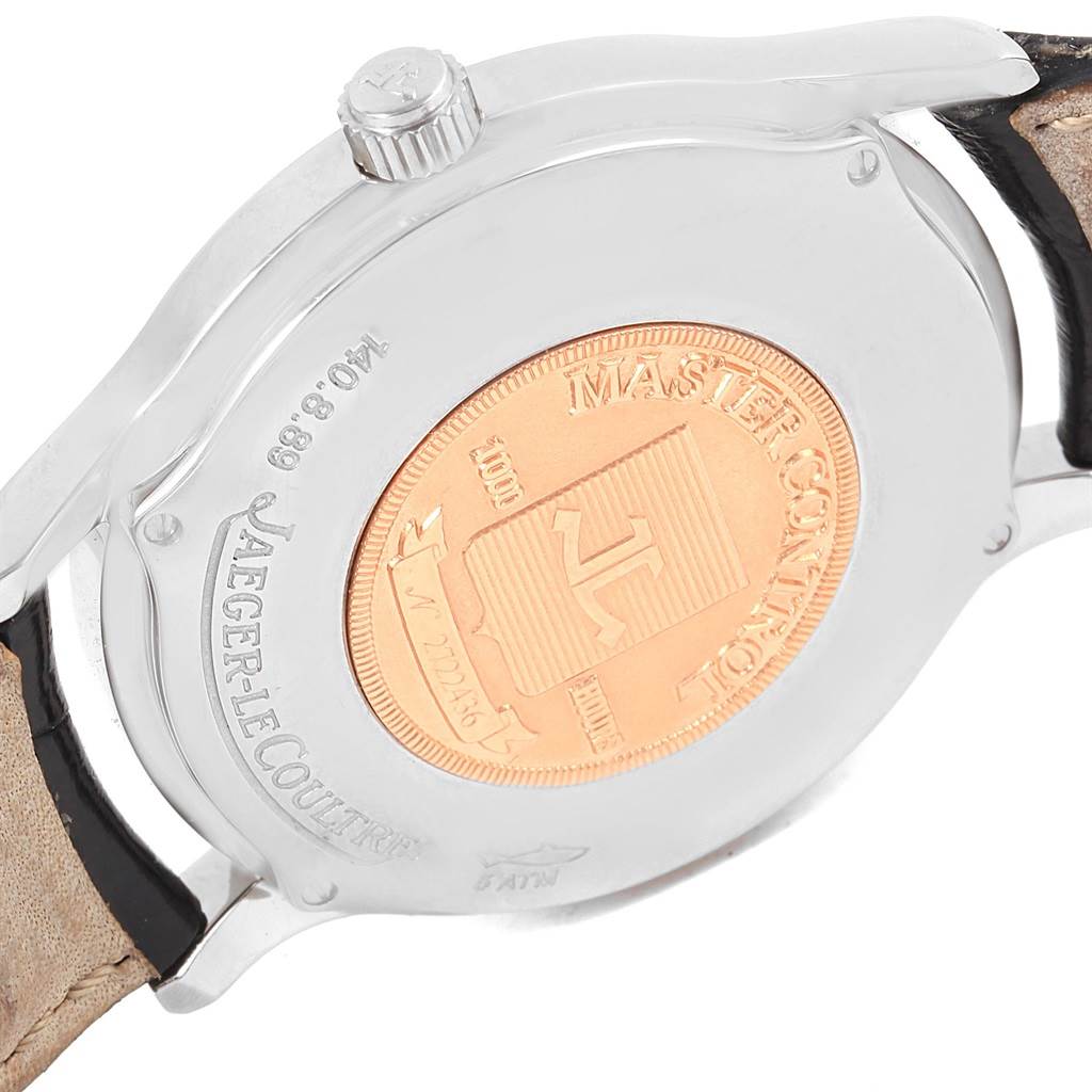 This image shows the back of a Jaeger-LeCoultre Master Control watch, highlighting the case back, crown, and strap attachment.