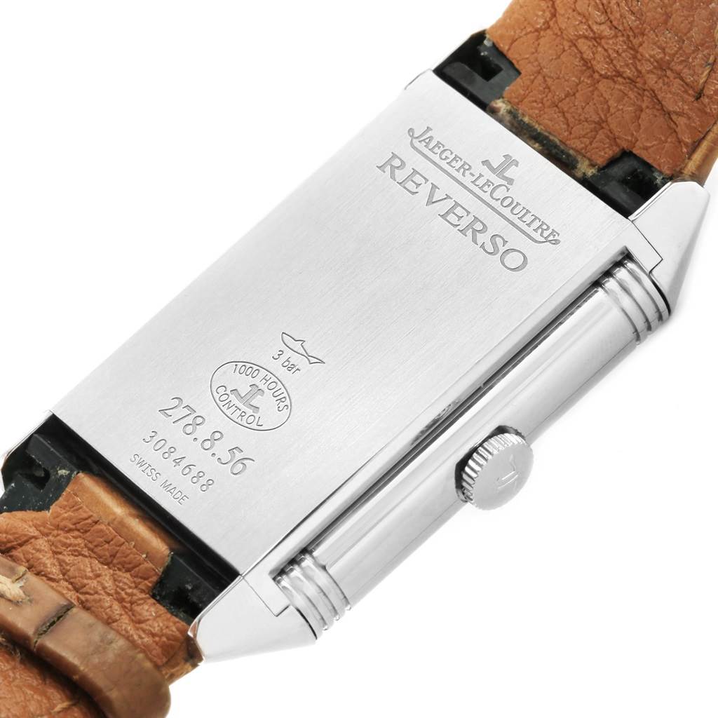 The image shows the backside of a Jaeger LeCoultre Reverso Q3808420 Men's Stainless Steel Silver Dial Q3808420 Men's Stainless Steel Silver Dial watch, including the strap, case back, and crown.