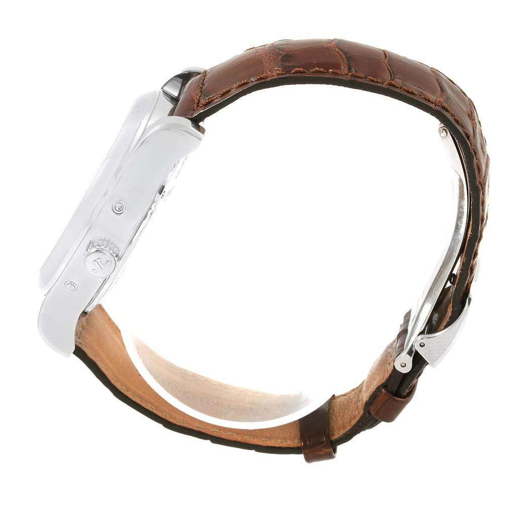 This image shows a side view of a Jaeger LeCoultre Master 147.8.41.S Men's Stainless Steel Silver Dial 147.8.41.S Men's Stainless Steel Silver Dial model watch, highlighting the case, crown, and leather strap.