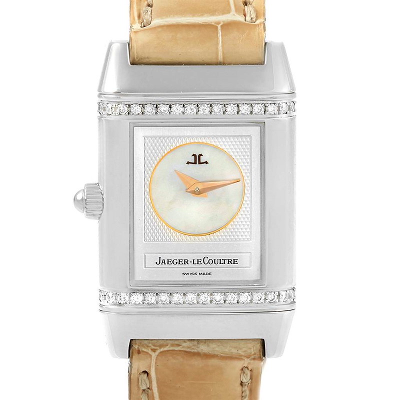 The image shows a front view of a Jaeger-LeCoultre Reverso watch with its face, bezel, and strap visible.