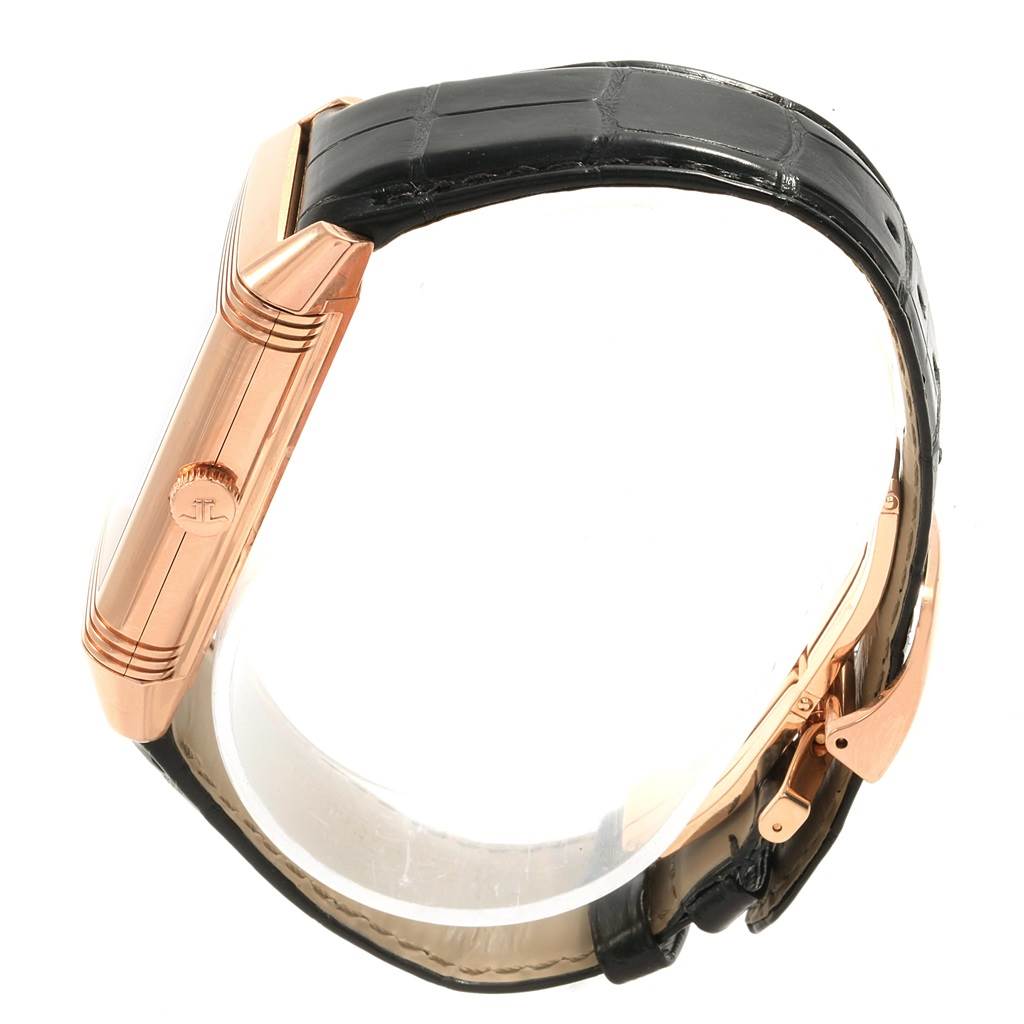 The image shows a side view of the Reverso model by Jaeger LeCoultre, highlighting the case and partially the strap and clasp.