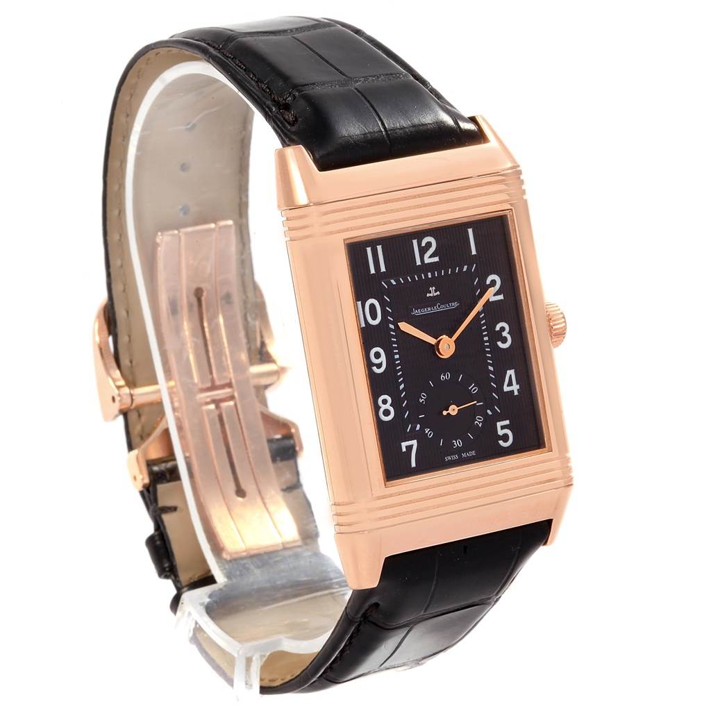 The image shows a Jaeger LeCoultre Reverso Q3732470 Men's Rose Gold Black Dial Q3732470 Men's Rose Gold Black Dial watch from a three-quarter angle, highlighting its rose gold case and black leather strap.