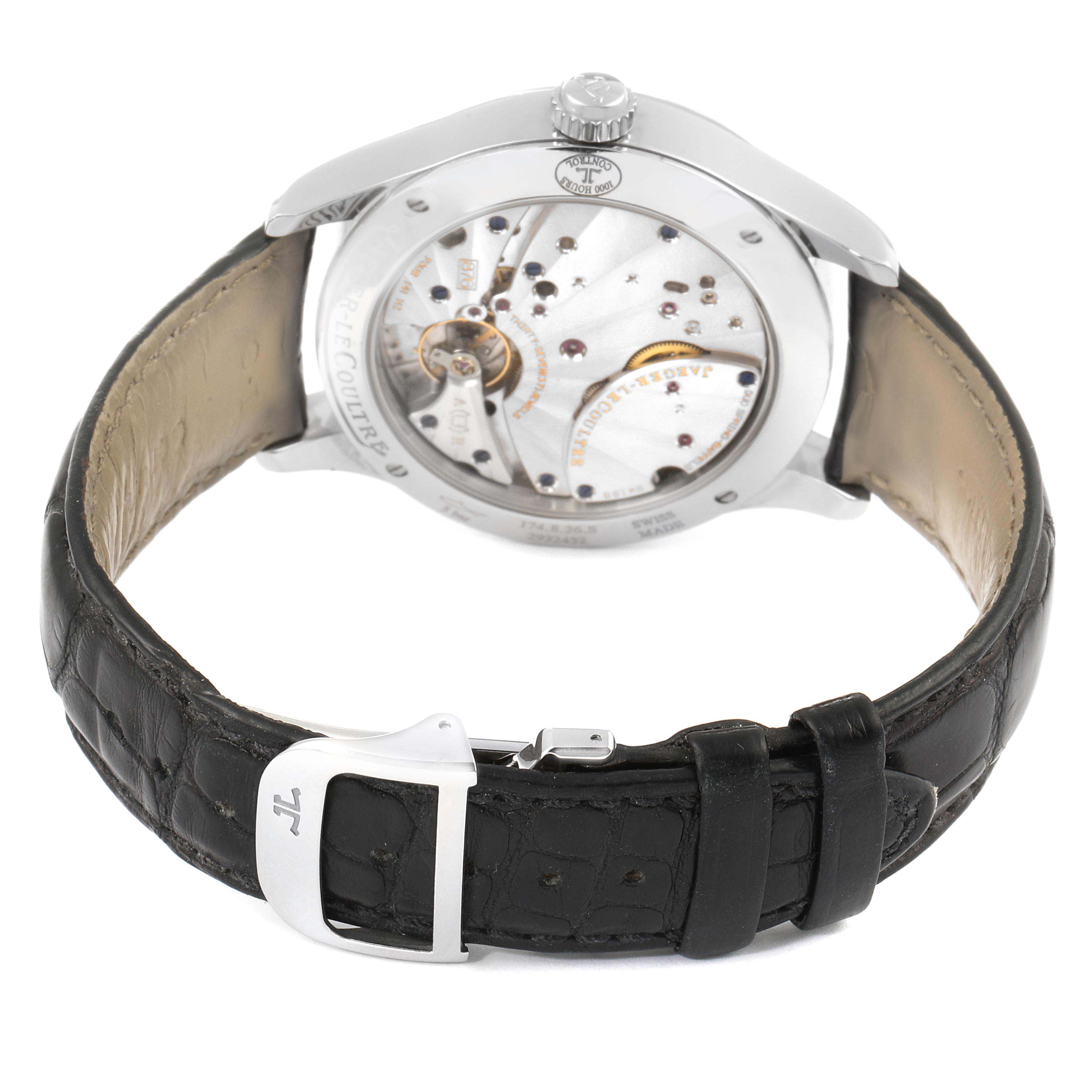 The image shows the back view of a Jaeger LeCoultre Master Q174826S Men's Stainless Steel Silver Dial Q174826S Men's Stainless Steel Silver Dial model watch, highlighting its movement and black leather strap.