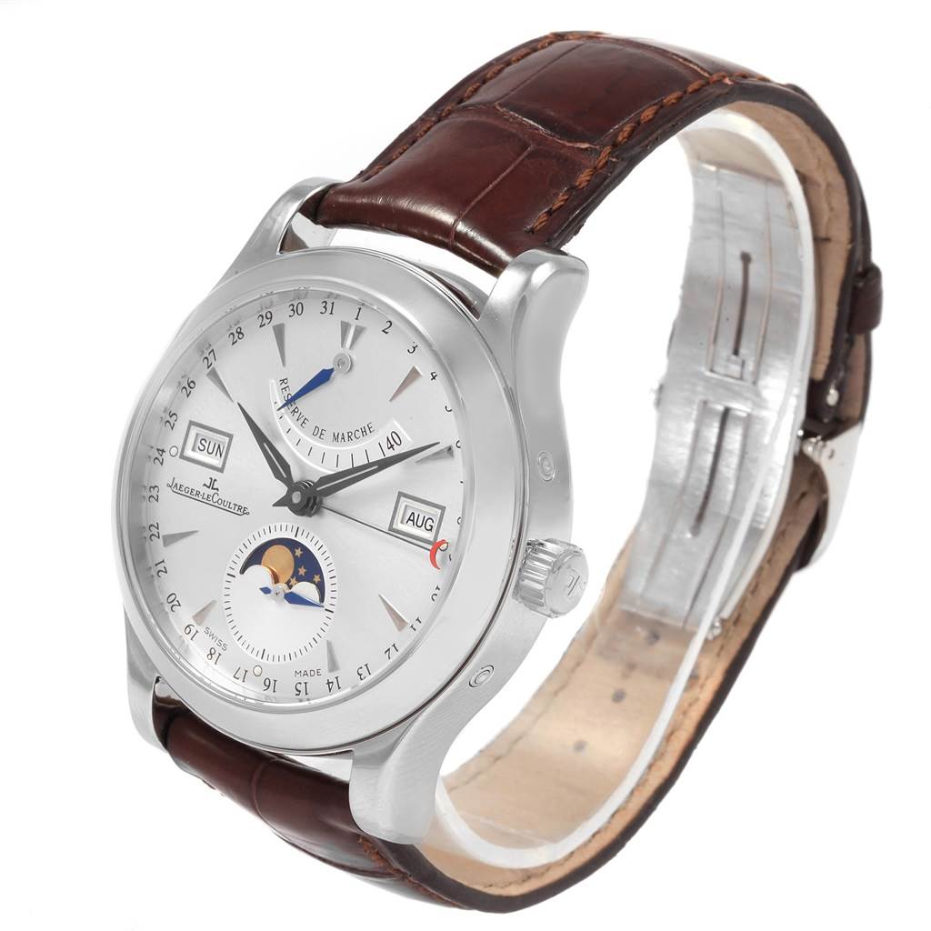 The Jaeger LeCoultre Master 147.8.41.S Men's Stainless Steel Silver Dial 147.8.41.S Men's Stainless Steel Silver Dial watch is shown at an angle highlighting the dial, case, crown, and brown leather strap.