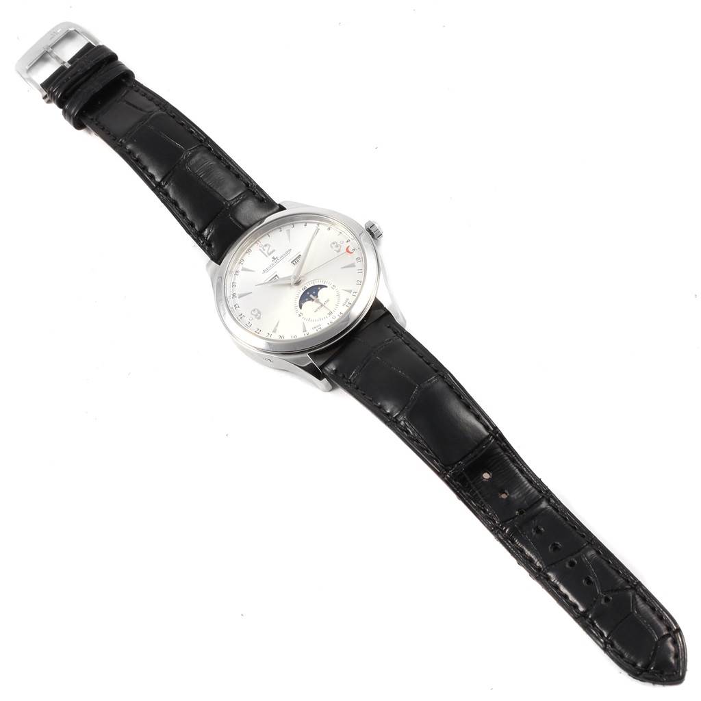 The image shows a Jaeger-LeCoultre Master model watch from a top-down angle, featuring its dial, case, and black leather strap.