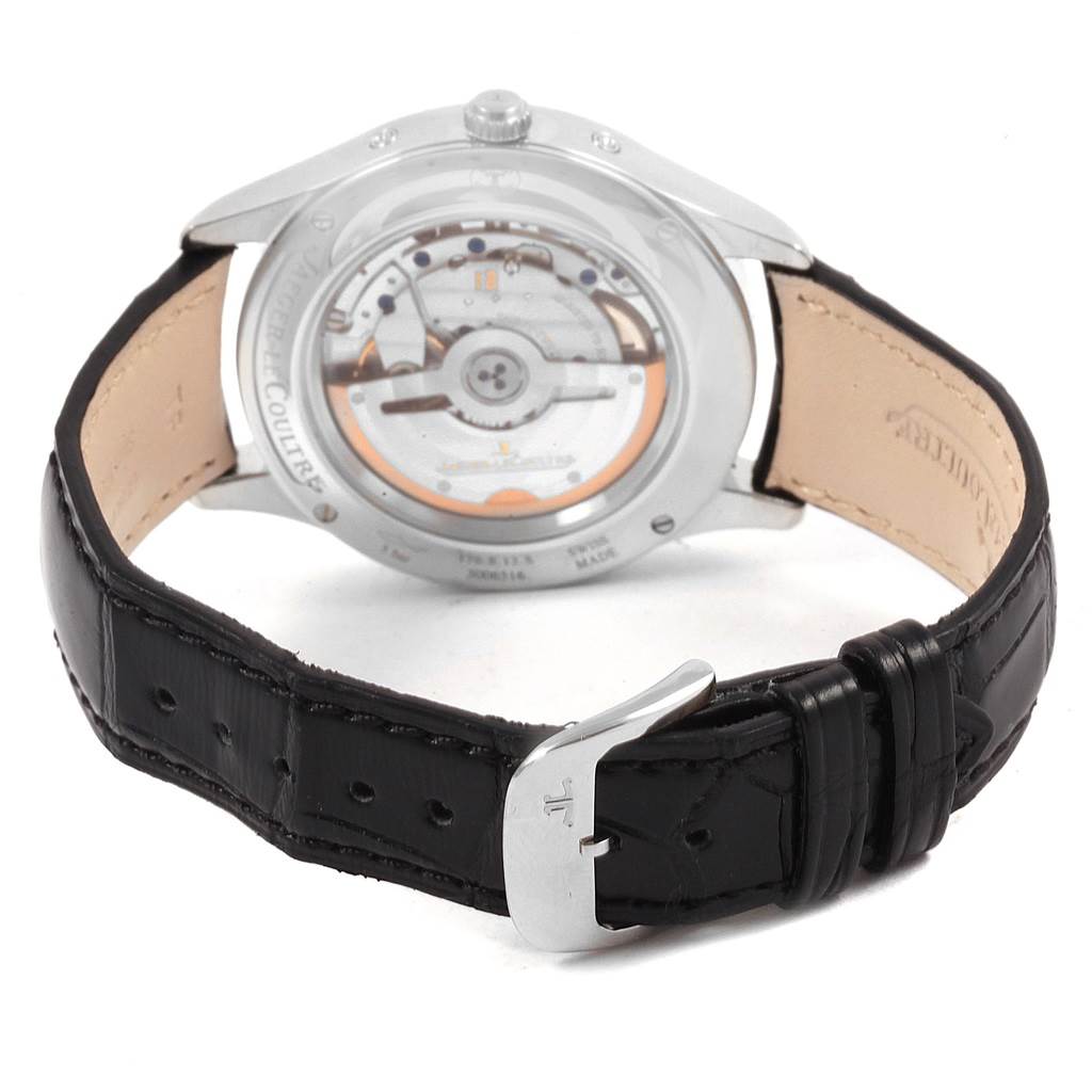The image shows the back view of the Jaeger-LeCoultre Master model watch with a visible movement and black leather strap.