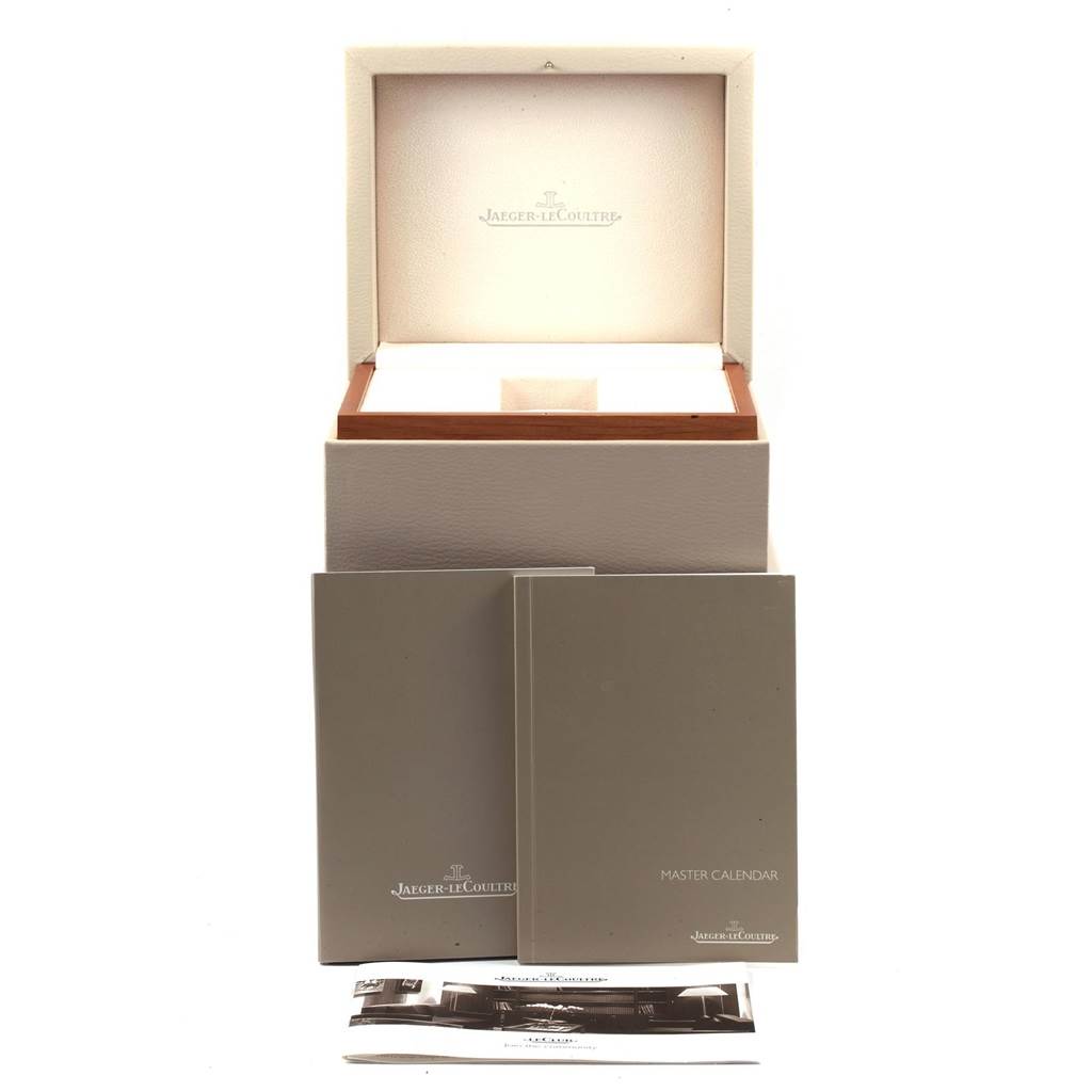 The image shows the packaging, manuals, and box for a Jaeger LeCoultre Master Q1558420 Men
s Stainless Steel Silver Dial Q1558420 Men
s Stainless Steel Silver Dial model watch.