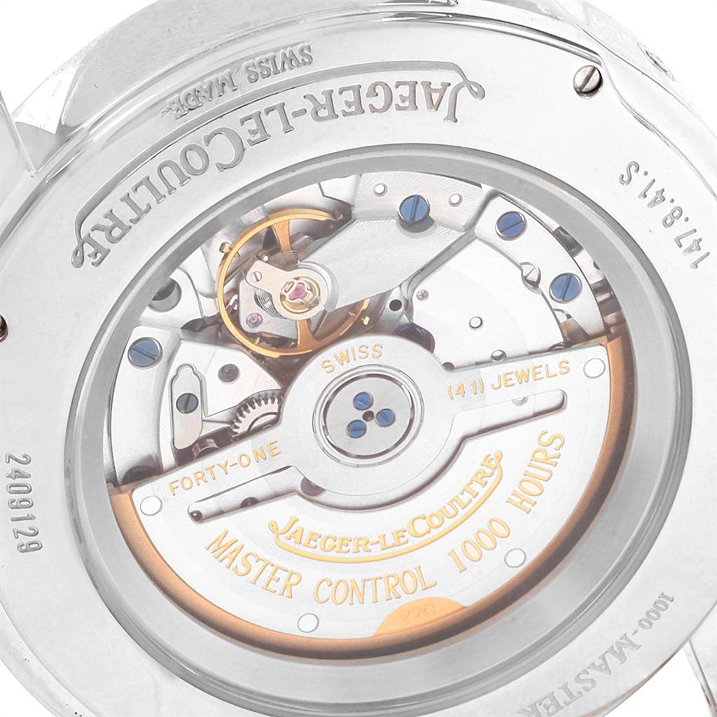 The image shows the open case back of a Jaeger-LeCoultre Master model, revealing its intricate movement components.