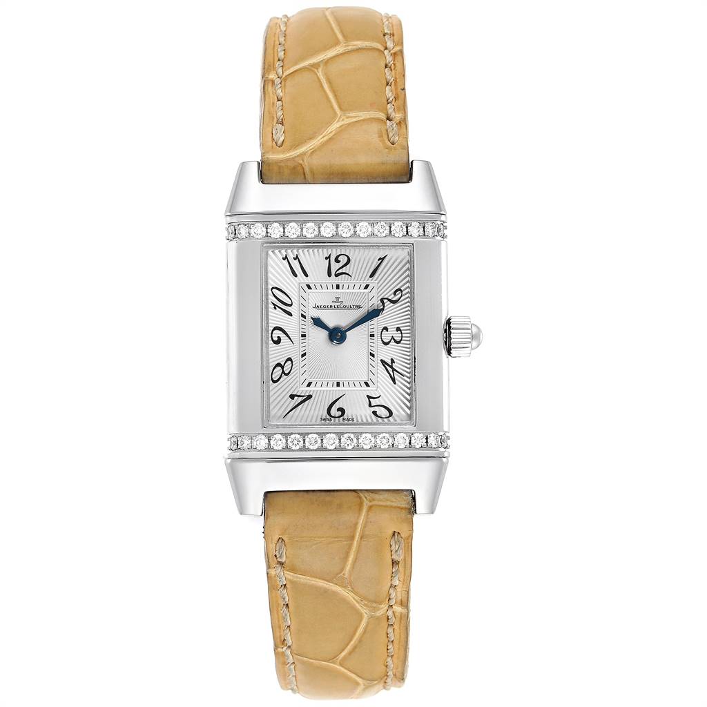 The image shows a front view of a Jaeger LeCoultre Reverso Q2658430 Women's Stainless Steel Silver Dial Q2658430 Women's Stainless Steel Silver Dial watch with a beige leather strap and diamond bezel.