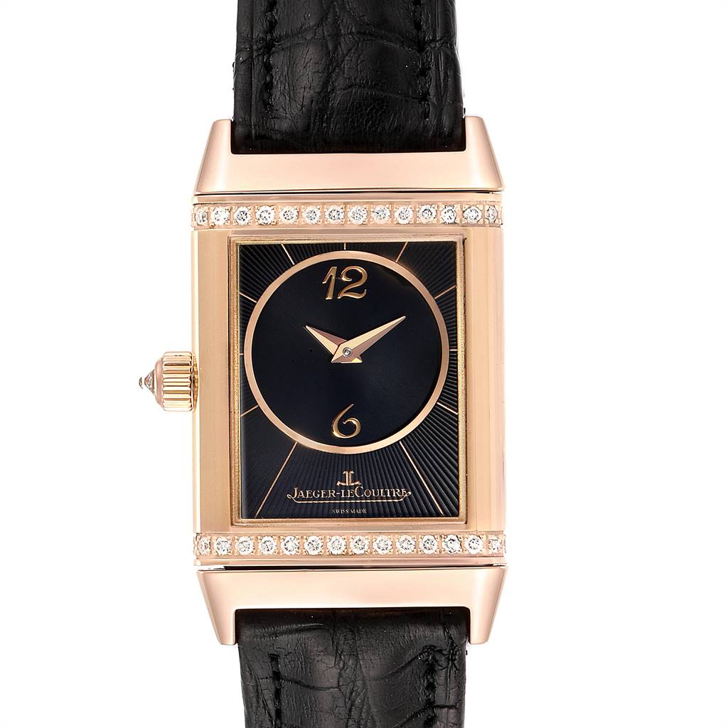 This image shows a front view of the Jaeger LeCoultre Reverso Q2562402 Women's Rose Gold Silver Dial Q2562402 Women's Rose Gold Silver Dial watch, featuring a black dial, diamond accents, and black leather strap.