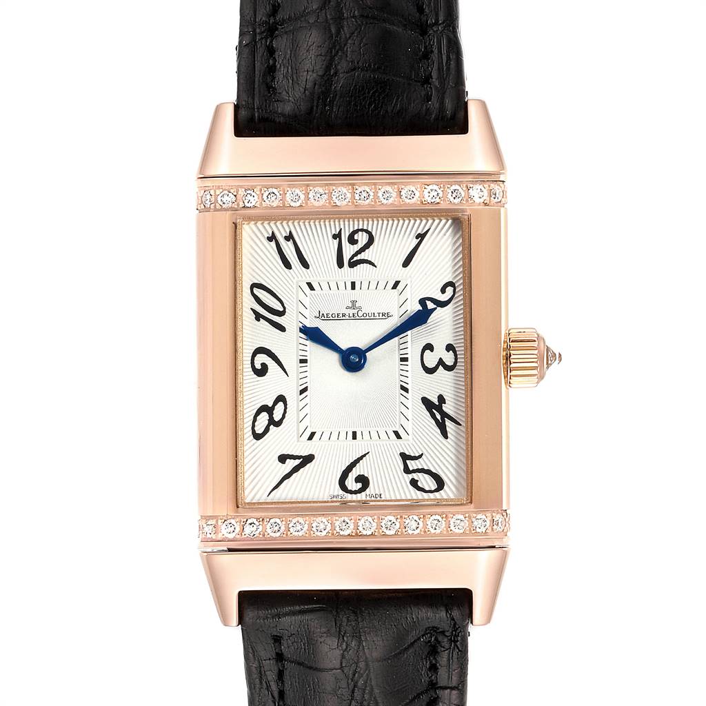 This image shows a front view of a Jaeger LeCoultre Reverso Q2562402 Women's Rose Gold Silver Dial Q2562402 Women's Rose Gold Silver Dial watch, including its rectangular face, hour markers, hands, crown, and strap.