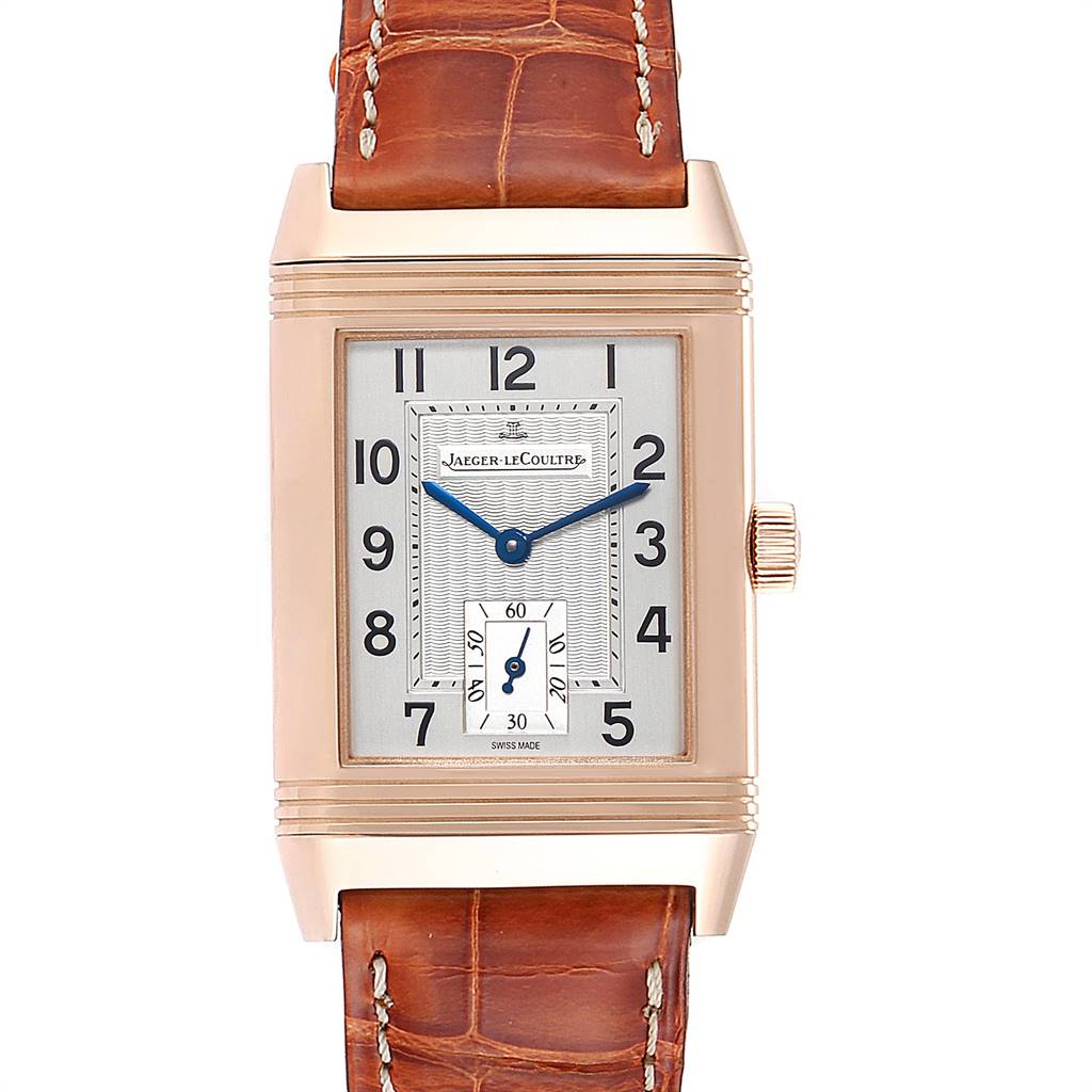 The image shows a front view of a Jaeger LeCoultre Reverso 270.2.62 Men's Rose Gold Silver Dial 270.2.62 Men's Rose Gold Silver Dial watch with a rectangular dial and brown leather strap.