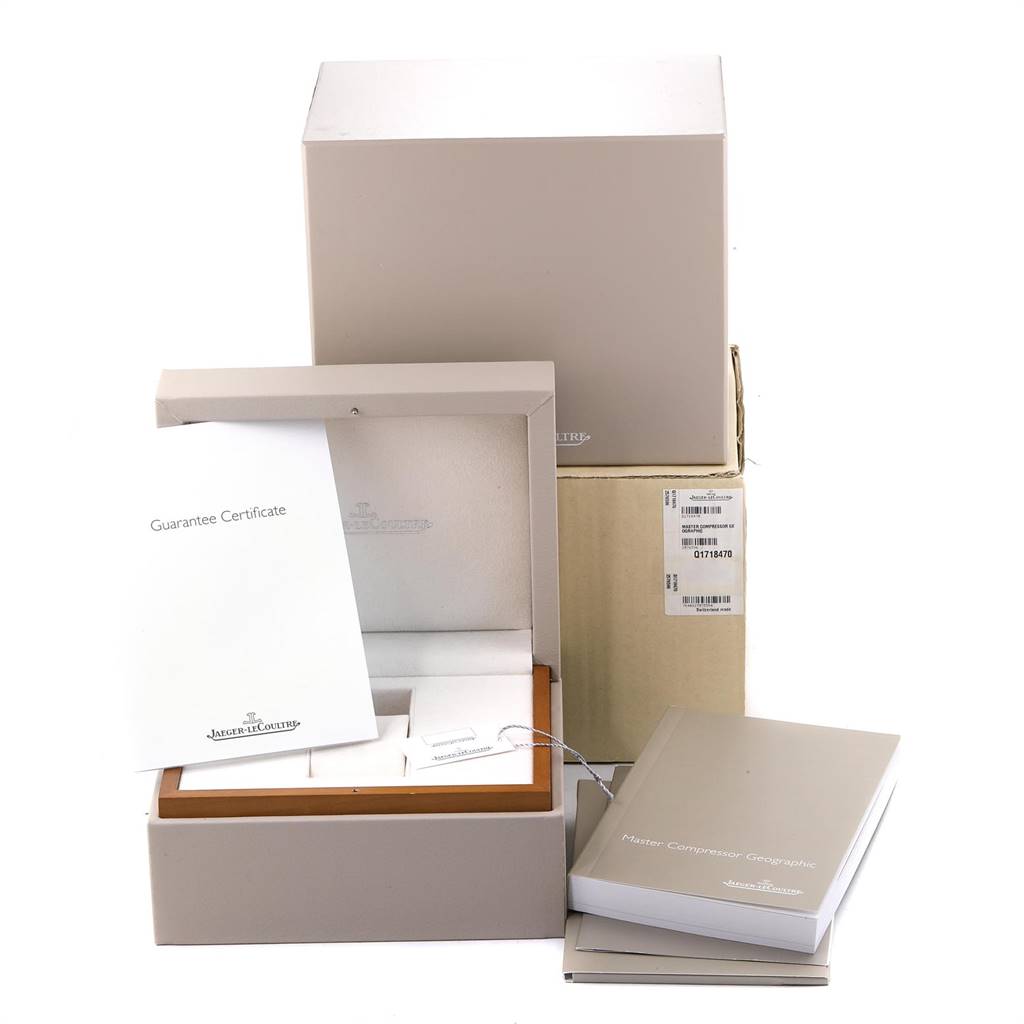 The image shows the packaging, guarantee certificate, and manuals for the Jaeger-LeCoultre Master model watch.