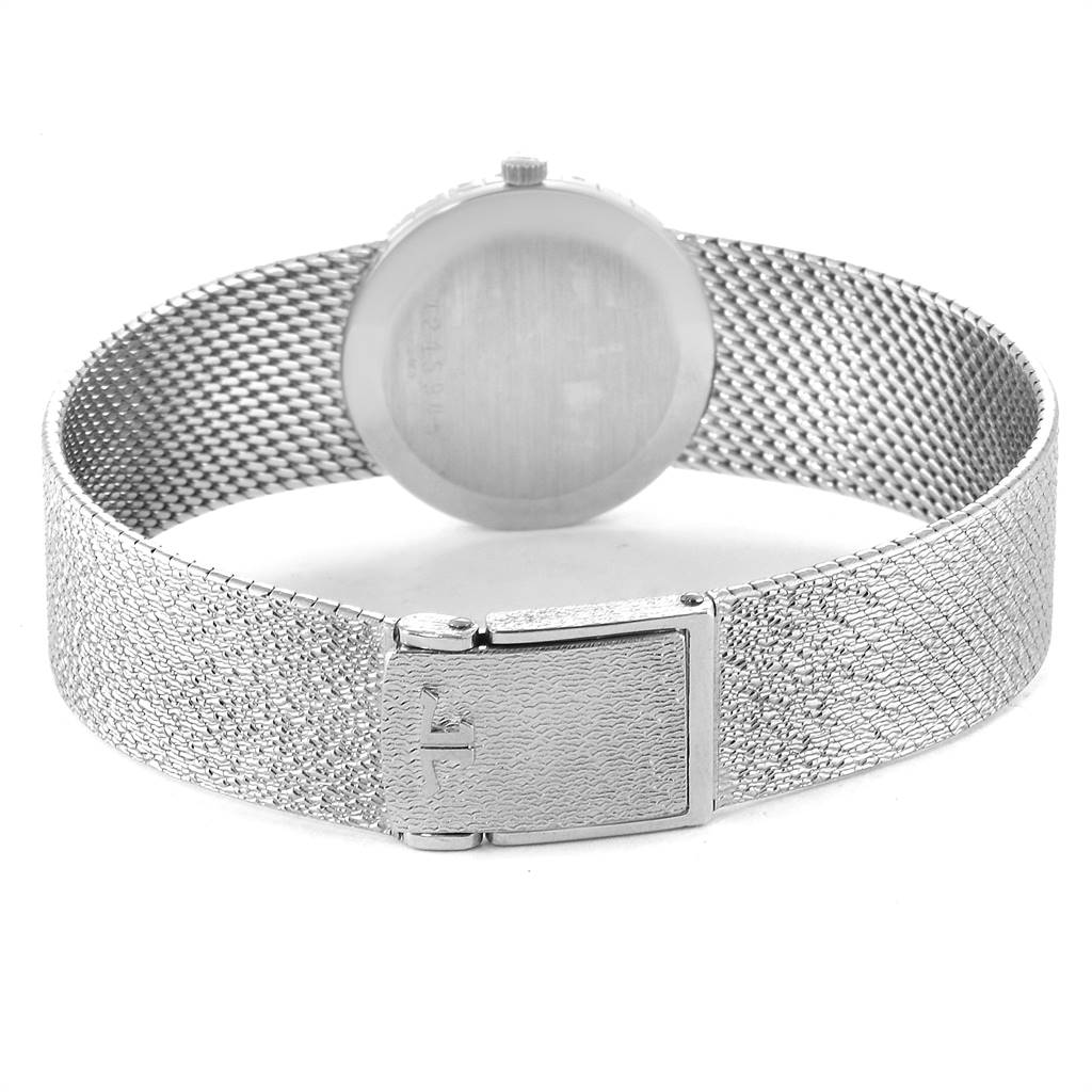 The image shows the back view of a Vintage Jaeger LeCoultre watch, highlighting its mesh strap and clasp.