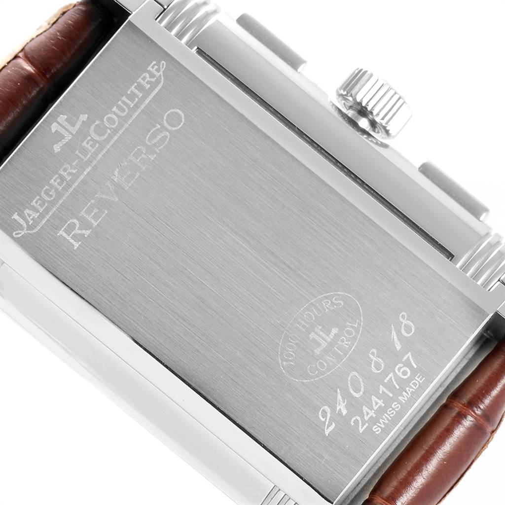 The image shows the back case, crown, and part of the leather strap of a Jaeger LeCoultre Reverso Q3028420 Men's Stainless Steel Silver Dial Q3028420 Men's Stainless Steel Silver Dial watch.