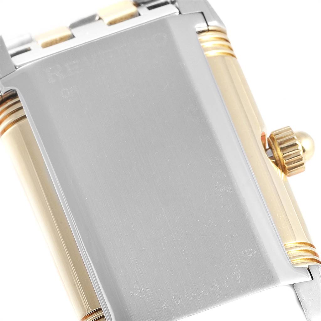 This image shows the back case and crown of a Reverso model watch by Jaeger LeCoultre from an angled perspective.