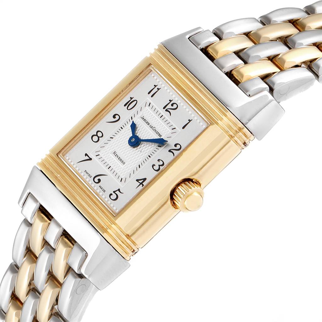 The image shows a Jaeger-LeCoultre Reverso watch angled to highlight the rectangular face, crown, and two-tone metal bracelet.