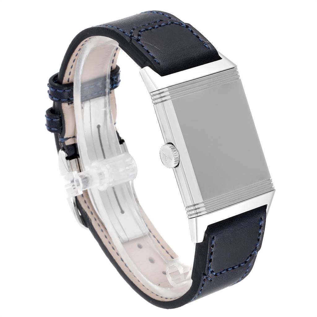 The image shows a side view of a Jaeger LeCoultre Reverso Q3978480 Men's Stainless Steel Blue Dial Q3978480 Men's Stainless Steel Blue Dial watch, highlighting the case, crown, and leather strap with stitching.