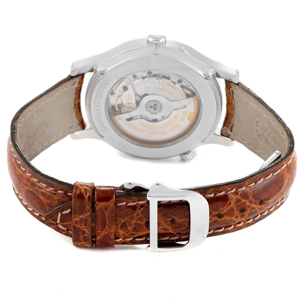 This image shows the back view of a Jaeger LeCoultre Master Q1428470 Men's Stainless Steel Black Dial Q1428470 Men's Stainless Steel Black Dial watch, focusing on its movement and brown leather strap with a buckle.