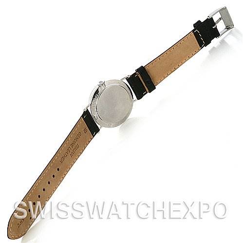 This image shows the backside of a vintage Vacheron Constantin watch, including its leather strap and buckle.