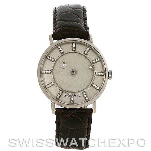 This image shows a Vintage Jaeger LeCoultre watch, front view, highlighting its dial, hour markers, and leather strap.