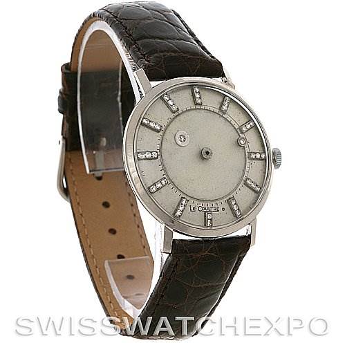 This is a side-angle view of a Vintage Jaeger LeCoultre watch, showing the face, strap, and crown.