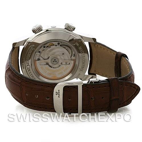The image shows the back view of a Jaeger-LeCoultre Master watch, focusing on its open case back and brown leather strap.