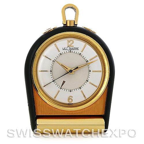 The image shows a front view of a Vintage Jaeger LeCoultre watch with a gold-tone case and black outer casing.