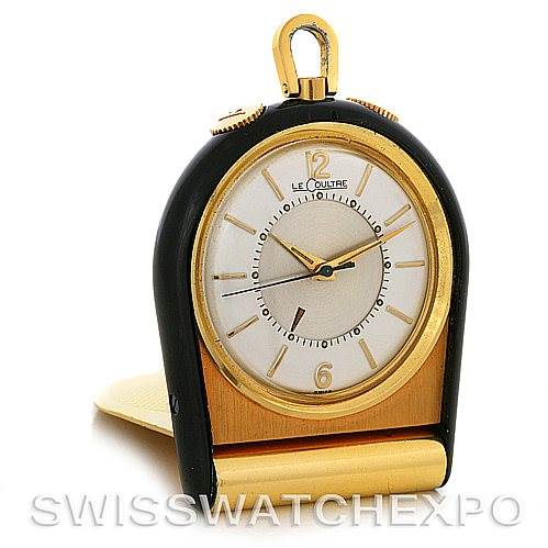 The image shows a front view of a vintage Jaeger LeCoultre watch with visible clock face and gold detailing.