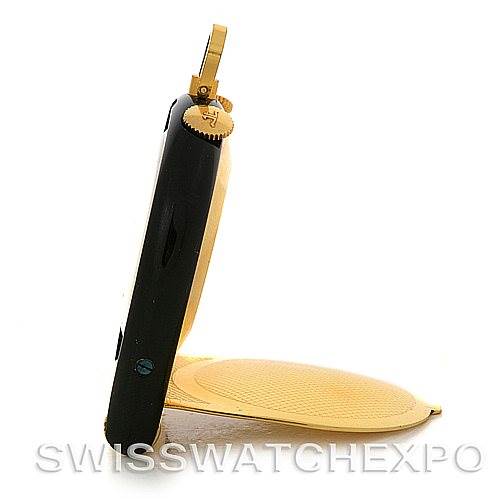 The image shows a side view of a Vintage Jaeger LeCoultre watch's open case and crown.