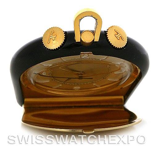 This image shows a front angle view of a Vintage Jaeger LeCoultre watch with an open hinged cover and visible crown and pushers.