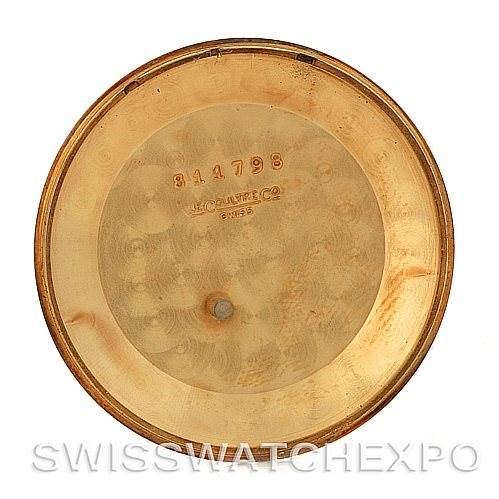 The image shows the inner back case of a Vintage Jaeger LeCoultre watch, displaying the brand engraving and serial number.