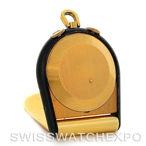 This image shows the back view of a Vintage Jaeger LeCoultre watch in a standing position, highlighting its case and bottom lid.