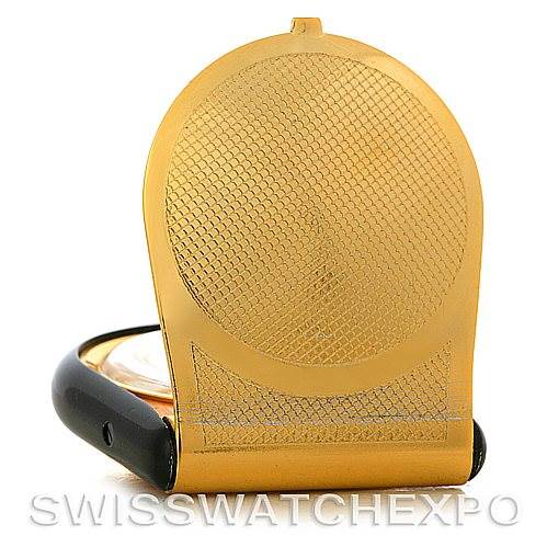 The image shows a rear angle of a vintage Jaeger-LeCoultre watch with its gold case back displayed and partially open.