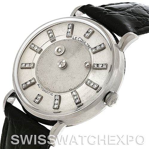 This image shows a side view of a Jaeger LeCoultre Vintage Men's White Gold Silver Dial Men's White Gold Silver Dial watch, displaying the dial, bezel, crown, and partially the leather strap.