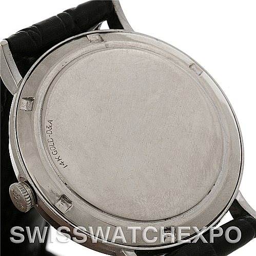 The image shows the back case and part of the strap of the Vintage Jaeger LeCoultre watch.