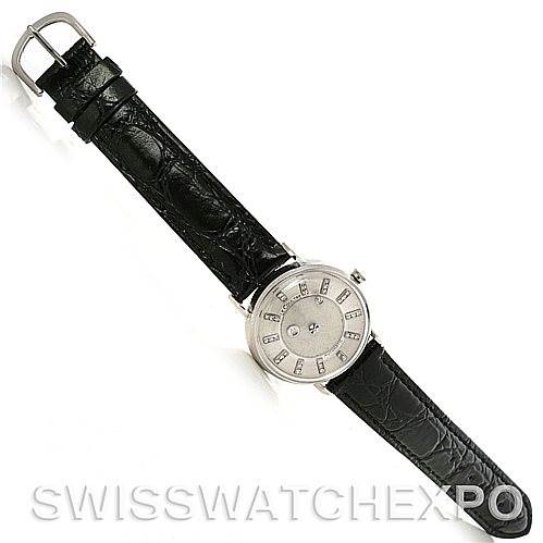 The image shows a full view of the Jaeger LeCoultre Vintage Men's White Gold Silver Dial Men's White Gold Silver Dial watch including the dial, case, strap, and buckle from a top-down angle.