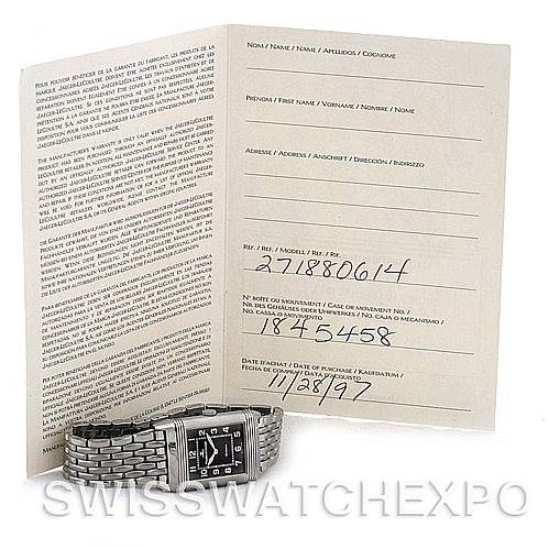 The image shows a Jaeger LeCoultre Reverso 271.8.61 Men
s Stainless Steel Grey Dial 271.8.61 Men
s Stainless Steel Grey Dial watch with a partial side view at an angle, alongside its certification booklet.