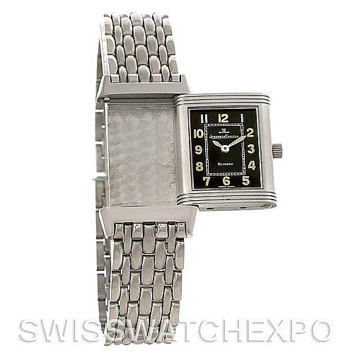 The image shows a Jaeger LeCoultre Reverso 261.8.86 Women's Stainless Steel Grey Dial 261.8.86 Women's Stainless Steel Grey Dial watch at an angle where the watch face is flipped to reveal the back surface and metal bracelet.