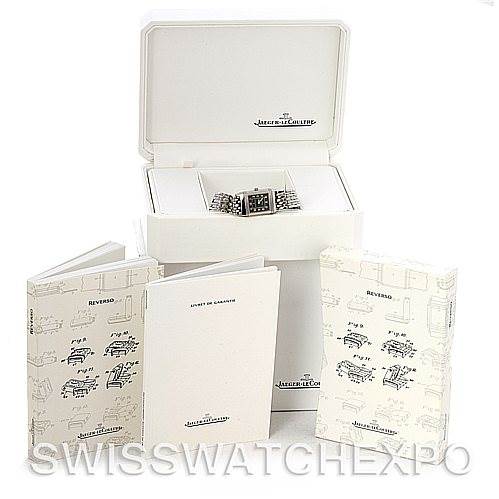 The image shows a Jaeger LeCoultre Reverso 261.8.86 Women's Stainless Steel Grey Dial 261.8.86 Women's Stainless Steel Grey Dial watch in its box, along with accompanying booklets and packaging.