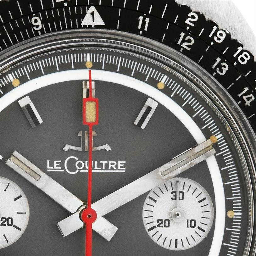 This image shows a close-up of the dial and subdials of a Vintage Jaeger LeCoultre watch, including the brand logo.