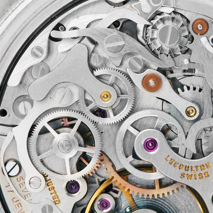 This is a close-up of the intricate internal mechanism of a vintage Jaeger LeCoultre watch, showcasing gears and components.