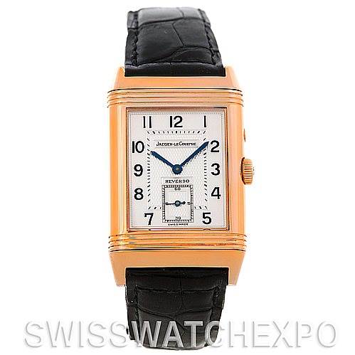 The Jaeger-LeCoultre Reverso watch is shown from the front angle, highlighting its face, case, and black leather strap.