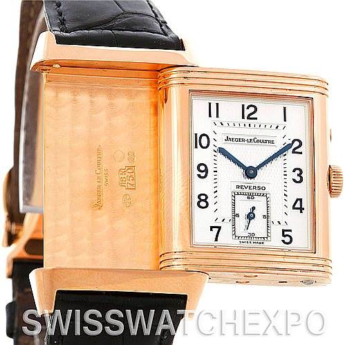 This image shows the Jaeger LeCoultre Reverso 270.254 Men's Rose Gold Silver Dial 270.254 Men's Rose Gold Silver Dial watch at an angle that reveals both the dial and the reverse side of the case.