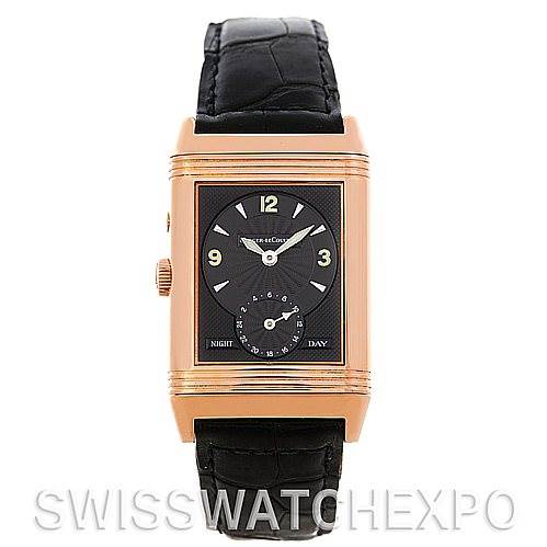 The image shows a frontal view of the Jaeger-LeCoultre Reverso watch with a black face and gold case.