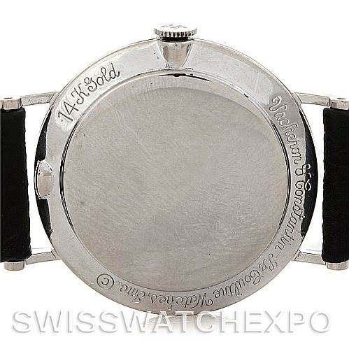 The image shows the back case of a Vintage Jaeger-LeCoultre watch, highlighting its 14K gold marking and strap attachments.