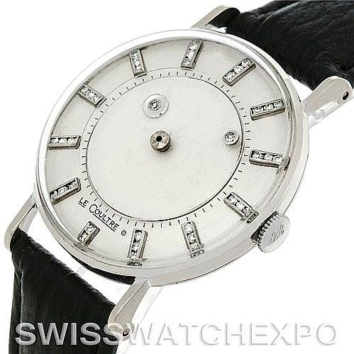 The image shows a side angle view of the Jaeger LeCoultre Vintage Men's White Gold Silver Dial Men's White Gold Silver Dial watch, highlighting the dial, band, and crown.