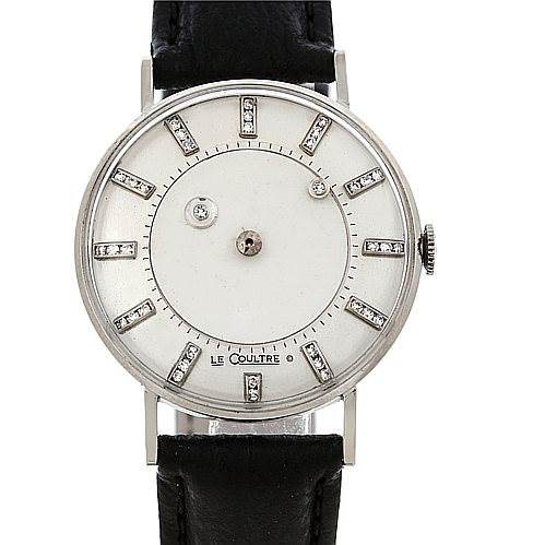 This image shows a front view of the Jaeger-LeCoultre Vintage model watch, highlighting the dial, markers, and crown, with a black leather strap.