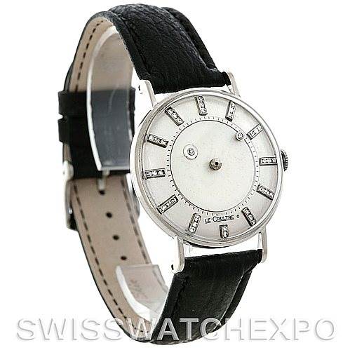 The image shows a Vintage Jaeger LeCoultre watch from a 3/4 angle, highlighting its dial, strap, and case.